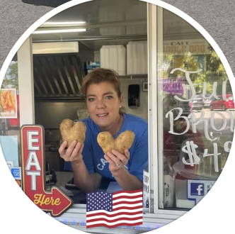 Cantrell's Grill owner at the food truck window
